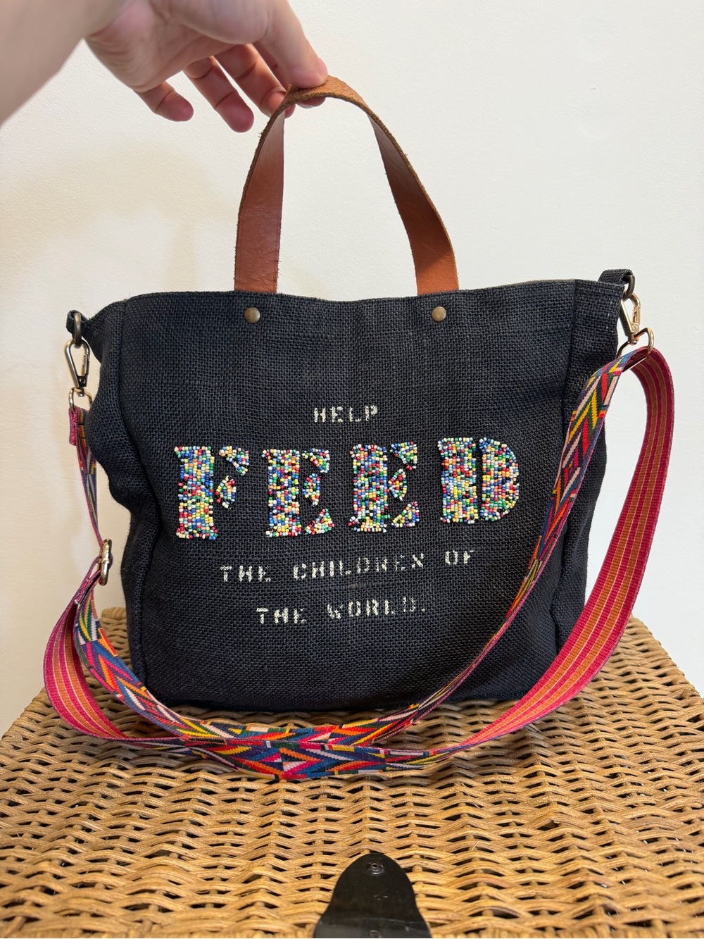 FEED Black Canvas Tote with Multicolor Beaded Logo and Striped Strap